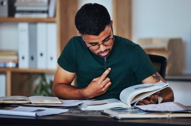 man reading thoughtfully