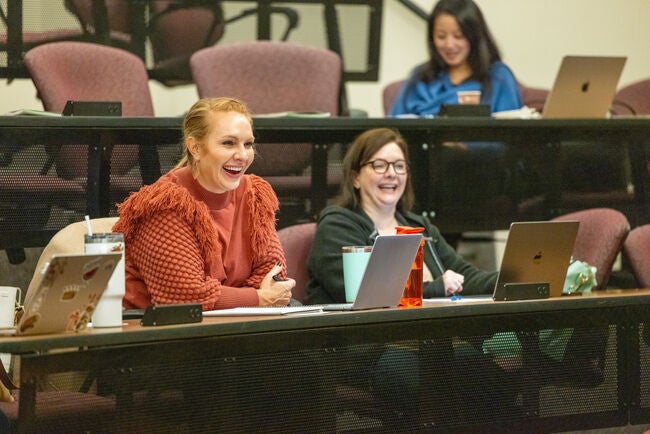 CSU Students laughing in class