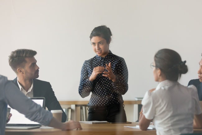 social worker speaking in front of a group